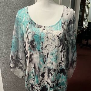 Floral Print Women's Top with sheer sleeves.
